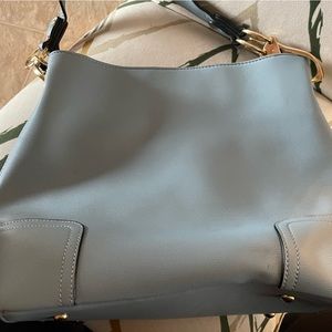 Light blue purse gold accents